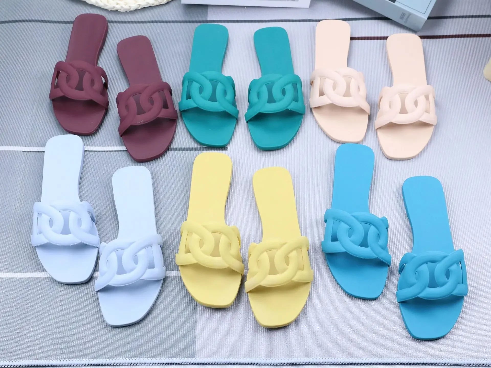 Summer women's one-word sandals daily leisure shopping beach wear flat shoes versatile solid color hollow